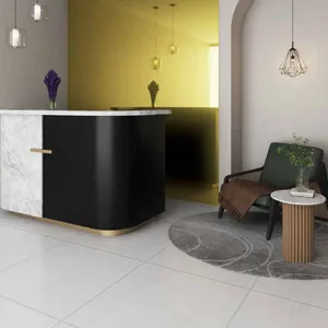 WPC Wall Board Bamboo Charcoal Roshan Mirror Series warna Phoenix Gold di meja resepsionis
